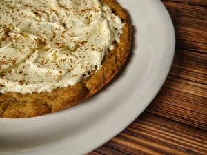 Easy to Bake Giant Pumpkin Pie Cookie with Pumpkin Spiced Cream Cheese Frosting