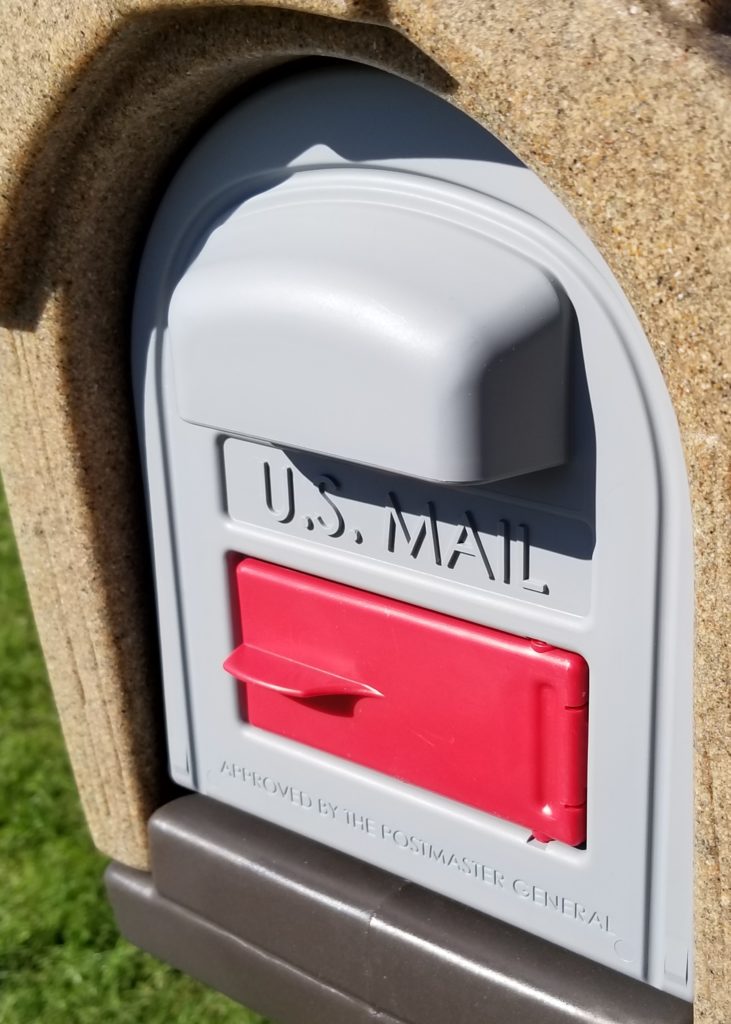 Add Country Charm to Your Driveway with a Rustic Mailbox